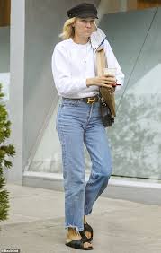 Big brother host sonia kruger cuts a chic figure in a designer wool coat as she jets into sydney. Diane Kruger Unwinds With A Cup Of Coffee After A Pampering Session At A Beverly Hills Salon Daily Mail Online