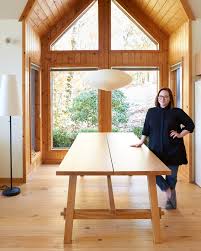 The lamp body is shaped like a tree branch with a sense of time that has been baptized. The Cabin Dining Nook Update An Ikea Table And A Noguchi Akari The Sweet Beast