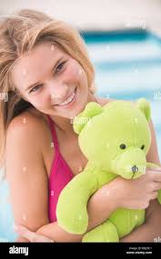 Holding stuffed toy hi-res stock photography and images