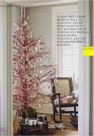 Rejuvinating A Dead Tree By Spray Painting It Red And Decorating Alternative Christmas Tree Christmas In July Alternative Christmas