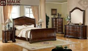 Malik Furniture Double Bed Designs In Wood Wood Dabal Bed Contemporary models, on the other hand, are characterized by compact and contained forms that adapt to the modern concept of space. bed set 42