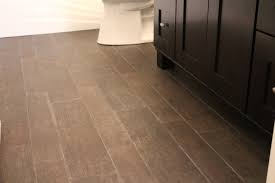 Useful Tips When Cleaning Wood Tile Floors So You Get A Beautiful Shine Wood Tile Floors Installing Tile Looks Like Wood Wood Look Tile Floor Wood Grain Tile