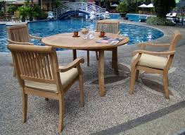 Round patio dining sets encourage a relaxed mood that pairs nicely with quiet times, family meals, and small gatherings. 5 Piece Luxurious Grade A Teak Dining Set 48 Inch Round Table Review Teak Patio Furniture World