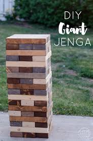 5 Diy Yard Games Hours Of Fun Jenga Dominoes Yahtzee Lemon Thistle Backyard Games Diy Diy Yard Games Backyard Games