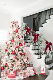 White Flocked Whimsical Glamorous Christmas Tree Decorated With Blush Pink And Red Glam Christmas Tree Red Christmas Decor Flocked Christmas Trees Decorated