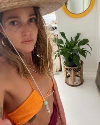 Who is Simon Baker's ex-girlfriend Laura Gibbs?