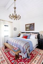 A spacious bedroom can be spruced up with one wall being uniquely painted in red. 25 Rustic Bedroom Ideas Rustic Decorating Ideas