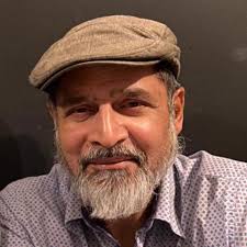 He was born in a Bedouin tent beneath the scorched skies of the Libyan  desert