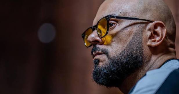 Carrim denies fleeing SA despite five bags, failing to produce return ticket