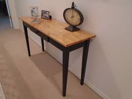 Kharisma rotan mandiri has been a leading indonesian rattan and wooden furniture manufacturer and exporter since 1996. Sofa Table Entry Table Console Table Tan Stained Top Black Painted Legs Wood Console Table Console Table Wood Console