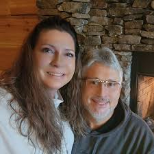 Who can add a carport to a newer metal garage?