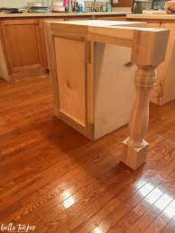| this sturdy farmhouse style kitchen island features two drawers and a large bottom shelf. Extending Island Turned Leg Bella Tucker
