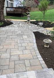 You can hear the echo of the craftsman's tools in the honest lines and rugged texture of blu. Techo Blu 60 Champlain Grey With Parisien Soldier Course Patio Pavers Design Landscaping On A Hill Outdoor Improvements