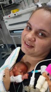 Christopher Swan sues Logan Hospital over premature twins