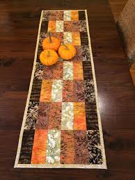 Modern Quilted Batik Table Runner In Orange Brown Green And Mustard Yellow Batik Table Runners Halloween Table Runners Quilted Table Runners Patterns