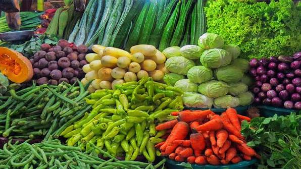 Negombo Town Market tropical fruits vegetables spices street food hoppers morning Sri Lanka