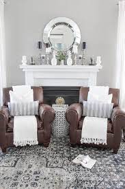 Living Room With Blue And Gray Vintage Area Rug Pottery Barn Leather Club Chairs Tasseled Th Living Room Leather Pottery Barn Living Room Rugs In Living Room