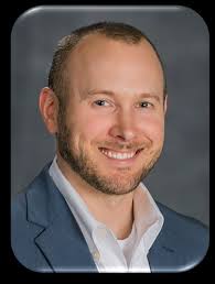 PERI faculty members (from left) Steven Sprick Schuster and Daniel Smith  celebrate PERI Fellow Gabriel Benzecry's successful def