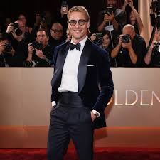 Glen Powell Just Arrived at the Golden Globes in a Midnight Blue Tux