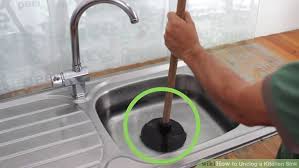 here kitchen sink and how to unclog it