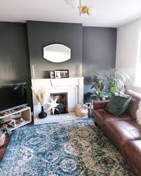 Sitting Room With Dark Grey Painted Wall In Farrow And Ball Downpipe Ikea Vonsbak Rug And Df Tile Floor Living Room Ikea Living Room Leather Sofa Living Room
