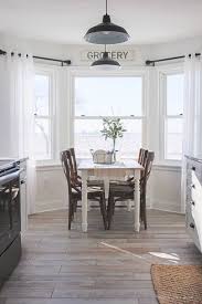 Installing a bay window is relatively affordable, especially if you do it yourself. Beautiful Modern Farmhouse Kitchen Makeover Farmhouse Dining Room Dining Table In Kitchen Farmhouse Dining