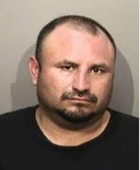 Man charged in fiery Oakland double killing