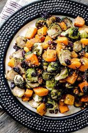 Easy Roasted Brussel Sprouts And Butternut Squash Roasted In Dijon Maple Butter Sauce And Brussel Sprouts Recipe Oven Butternut Squash Risotto Risotto Recipes