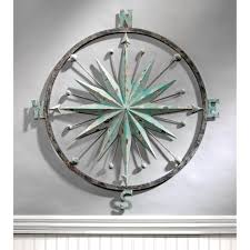 This beloved symbol of the sea is a fine accent to nautical, beach compass rose lightly distressed metal wall hanging. Blue Metal Wall Decor You Ll Love In 2021 Wayfair