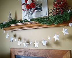 Cut out the shapes (the circles are sized for a 2 inch circle punch if you happen to have one), and fold each one in half down the middle. Diy Paper Star Garland
