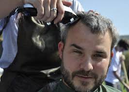 Fraternity loses hair while raising funds for cancer