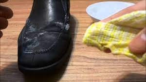 Again using gentle, circular motions, carefully clean the surface of the shoes, then wipe down with a damp cloth to remove any remaining residue. How To Remove Salt Stains From Shoes Water And White Vinegar Solution Youtube