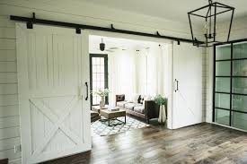 Farmhouse wooden double doors these pretty double doors create a warm and inviting welcome. Add Rustic Farmhouse Decor To Your Home With Barn Doors Craft Mart