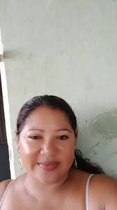 Person with Dark Hair in Light Tank Top