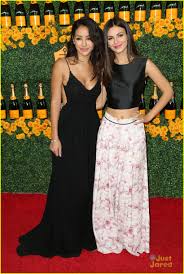 Victoria Justice And Nina Dobrev Posing Together For A Photo On Craiyon
