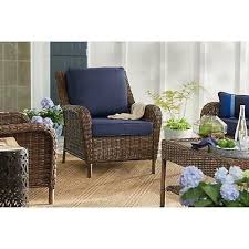 Add Comfortable Seating To Your Outdoor Living Space With This Hampton Bay Cambridge Brown Stationa Wicker Porch Furniture Lounge Chair Outdoor Porch Furniture