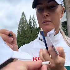 Charley Hull signs fan's dart, continues legendary viral run