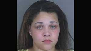 Police: Woman accused of shoplifting bites officer