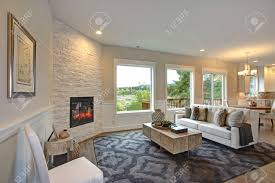 Mix 50/50 paint and water. Relaxing White Living Room Features Corner Stone Fireplace Lined Stock Photo Picture And Royalty Free Image Image 89473910