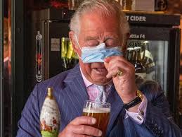 Prince Charles laughs as he struggles ...