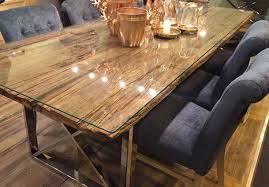 The norman reclaimed dining table embodies true rustic appeal with its characteristic frame created from reclaimed pine wood. Reclaimed Wood Dining Tables Homifind