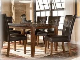 One Of The All Time Best Choices With A Faux Granite Top And Leather Look Padded Chairs Up Ashley Furniture Dining Room Granite Dining Table Dining Room Sets