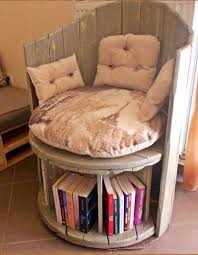 Reading Chair Made From An Old Cable Spool And Slat Wood Back Spool Has Been Divided Off Underneath To Serve As Boo Spool Furniture Pallet Furniture Furniture