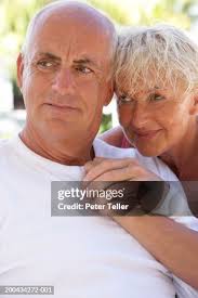 Mature Couple Holding Hands Close Up High-Res Stock Photo