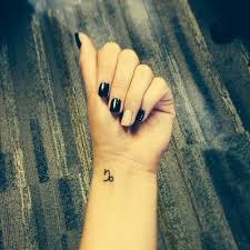 Pin By Dieuvan On Cappyyyy Tattoos Wrist Tattoos For Guys Capricorn Tattoo