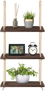 Some decorating ideas for bookcases by fireplaces is to use a planter or vase as a bookend. Amazon Com Mkono Wall Hanging Shelves Wood Window Rope Shelf 3 Tier Rustic Storage Rack Home Decor Plants Photos Decorations Display For Living Room Bathroom Bedroom Kitchen Apartment Office Kitchen Dining