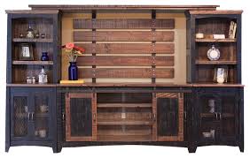 Two large shelves for books or anything else give you lots of storage space. Greenview Sliding Barn Door Media Wall Unit Distressed Black Rustic Entertainment Centers And Tv Stands By Crafters And Weavers Houzz