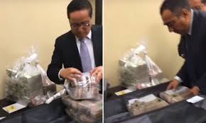 He signed one order on boosting food mr deese said the orders were not a substitute for a $1.9 trillion covid relief bill that mr biden wants congress to pass, but an essential. Piles Of Cash In Viral Video Stoke Bribery Scandal In Daily Mail Online