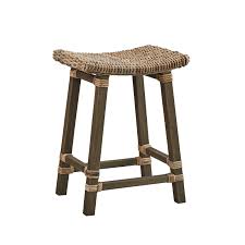 The gentle slope of its low camel back is echoed in the curved lines of the falling skirt for a sophisticated silhouette. Country Woven Kubu Counter Stool Painted Fox Home