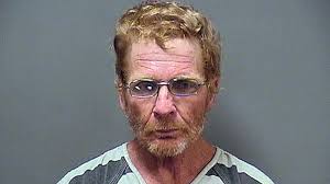 Out of the river and into a cell; rescued man arrested, jailed